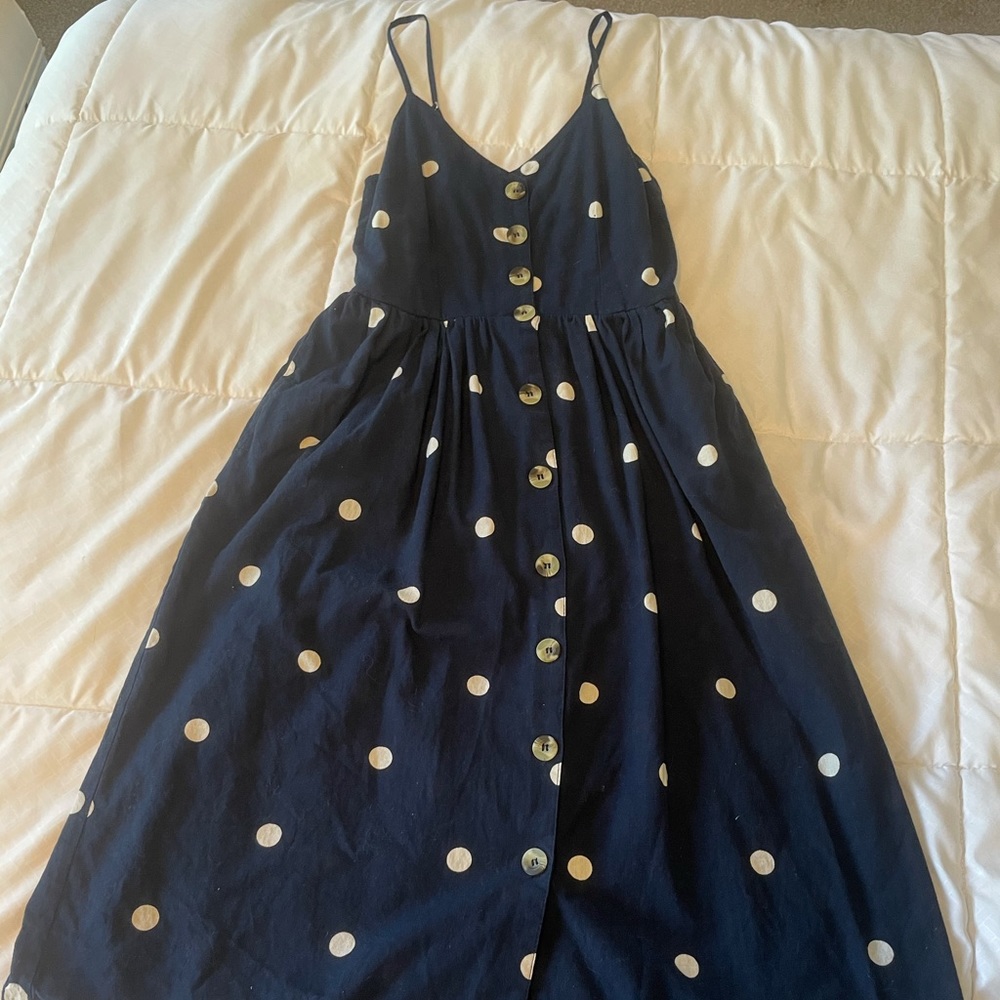 Tee length polka dot dress